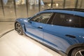 blue Porsche Taycan 4 Cross Turismo Electric Vehicle, battery-electric Car exhibition Museum Porsche, history and Innovation in