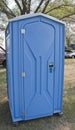 Blue Porta Potty Outhouse at an event