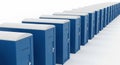 Blue portable toilets in a long line, ready for use Royalty Free Stock Photo
