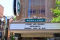 Blue Portland sign on brick building from distance in Portland, Oregon, USA with clear blue sky Royalty Free Stock Photo