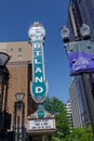 Blue Portland sign on brick building from distance in Portland, Oregon Royalty Free Stock Photo