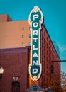 Blue Portland sign from 30's on brick building in Portland