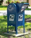 Blue postal mailbox