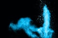 Blue powder explosion on black background. Royalty Free Stock Photo