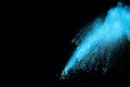 Blue powder explosion on black background. Royalty Free Stock Photo