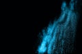 Blue powder explosion on black background. Royalty Free Stock Photo