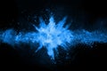 Blue powder explosion on black background. Royalty Free Stock Photo