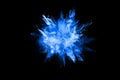 Blue powder explosion on black background. Freeze motion. Royalty Free Stock Photo