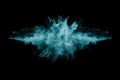 Blue powder explosion on black background.