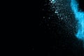 Blue powder explosion on white background. Royalty Free Stock Photo