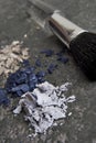 Blue powder makeup and brush