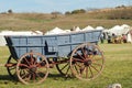 A blue prairie wagon at a reenactment