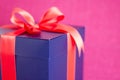 Blue present box with red ribbon isolated Royalty Free Stock Photo