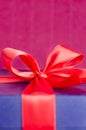 Blue present box with red ribbon isolated Royalty Free Stock Photo