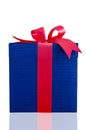 Blue present box with red ribbon isolated Royalty Free Stock Photo