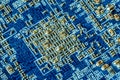 Blue PCB for computer components with electronic elements Royalty Free Stock Photo