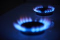 Blue propane gas flame. Burning gas. Kitchen stove burner. Natural gas market concept image with copyspace