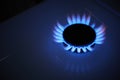Blue propane gas flame. Burning gas. Kitchen stove burner. Natural gas market concept image with copyspace Royalty Free Stock Photo