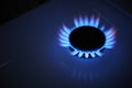 Blue propane gas flame. Burning gas. Kitchen stove burner. Natural gas market concept image with copyspace