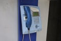 Blue public telephone Royalty Free Stock Photo