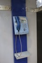 Blue public telephone Royalty Free Stock Photo