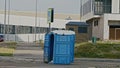 Blue public toilet at empty street of innopolis city