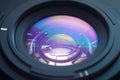 Blue and purple brilliance Reflection on a close up camera lens Royalty Free Stock Photo