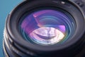 Blue and purple brilliance Reflection on a close up camera lens Royalty Free Stock Photo