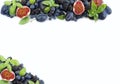 Blue and purple food. Ripe blueberries, blackberries, grapes, plums and figs. Royalty Free Stock Photo