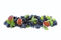 Blue and purple food. Ripe blueberries, blackberries, grapes, plums and figs. Royalty Free Stock Photo