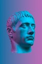 Blue purple gypsum copy of ancient statue of Germanicus Julius Caesar head for artists isolated on color background