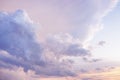 Blue purple lilac orchid pink peach white orange gold yellow cloudy evening sky background. Sunset clouds sun. Light pale pastel. Royalty Free Stock Photo