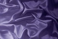 Blue purple lilac silk satin. Light dark. Gradient. Elegant background for design. Wavy folds. Fabric. Royalty Free Stock Photo