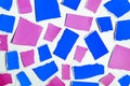 Blue and purple pieces of colored paper. Abstract color background. Torn paper on a white background. Royalty Free Stock Photo