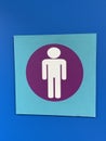 Blue and purple sign for Male water closet