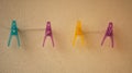 Clothes pegs of all colors on the washing line Royalty Free Stock Photo