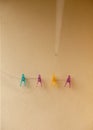 Clothes pegs of all colors on the washing line Royalty Free Stock Photo