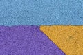 blue, purple and yellow triangles rough texture of rubber or carpet coating Royalty Free Stock Photo