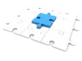 The blue puzzle piece in the center between the white puzzle pieces Royalty Free Stock Photo