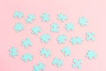 Blue puzzle pieces with empty space for your text and design on pink background Royalty Free Stock Photo