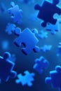Blue puzzle pieces floating against a dark abstract background Royalty Free Stock Photo
