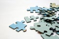 Blue puzzle pieces on white background Royalty Free Stock Photo