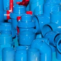 Blue PVC pipe joints and pipe clips Royalty Free Stock Photo