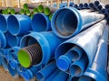 Blue PVC tubes in storage, Plastic tubes