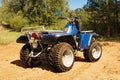 Blue quad on sand on the road, safari