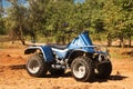 Blue quad on sand on the road, safari Royalty Free Stock Photo