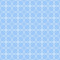 Blue quatrefoil lattice pattern.