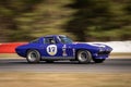 Blue race car at the track chevrolet