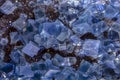 Blue raw fluorite crystal , macro, close up