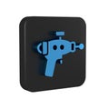 Blue Ray gun icon isolated on transparent background. Laser weapon. Space blaster. Black square button.